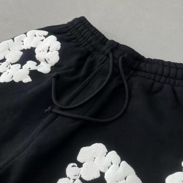DENIM TEARS WREATH BLACK SHORTS