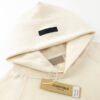 FEAR OF GOD ESSENTIALS MID-LOGO LIGHT APRICOT HOODIE